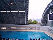 �����J��2